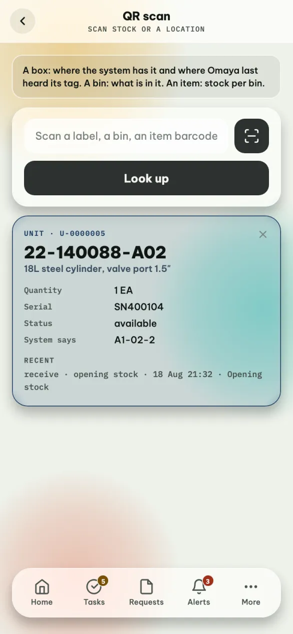 QR scan: a scan box with a camera button, Look up, and the card for one box with its quantity, serial, status, bin and recent history.